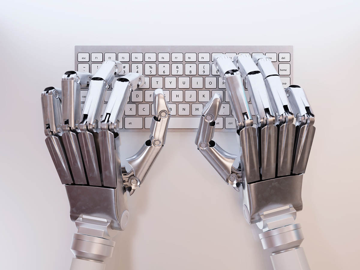 45260623 - robot typing on conceptual keyboard
